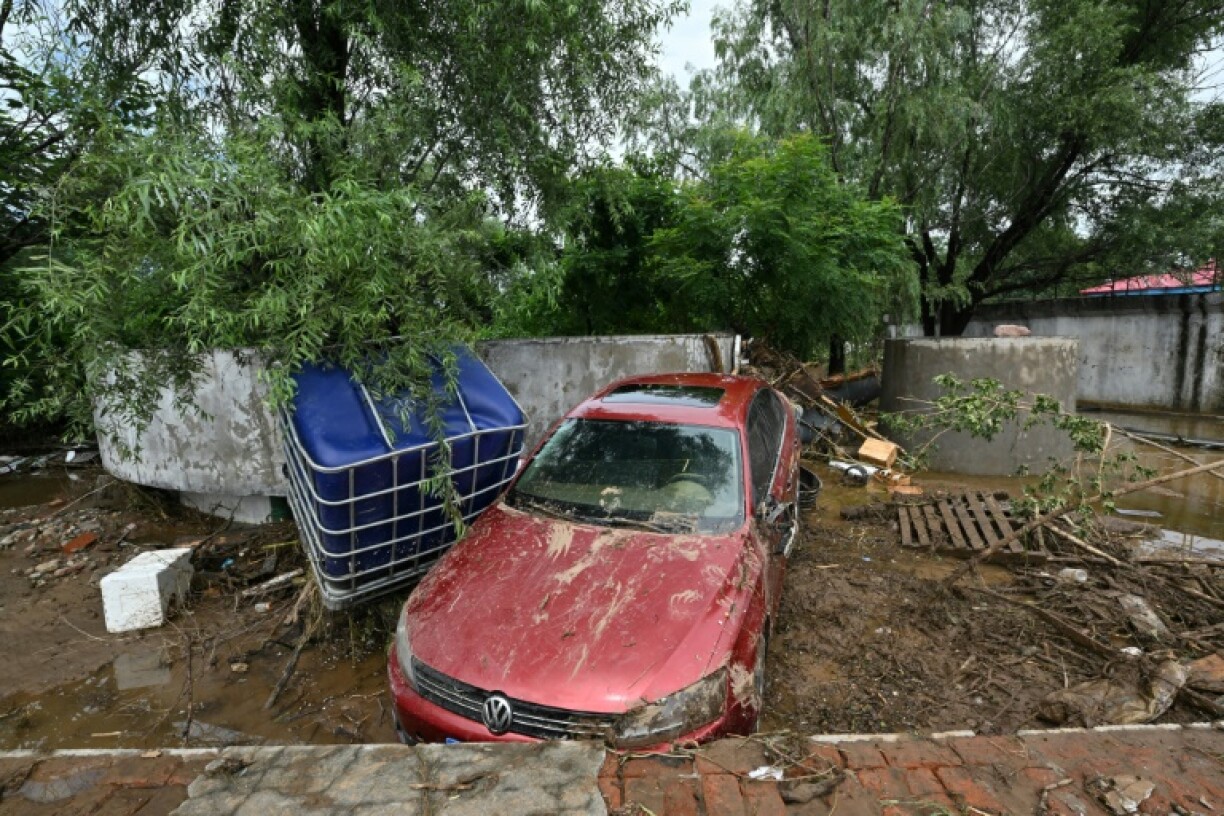 The government has allocated 350 million yuan ($49 million) for disaster relief in nine regions hit by heavy rains, state broadcaster CCTV says