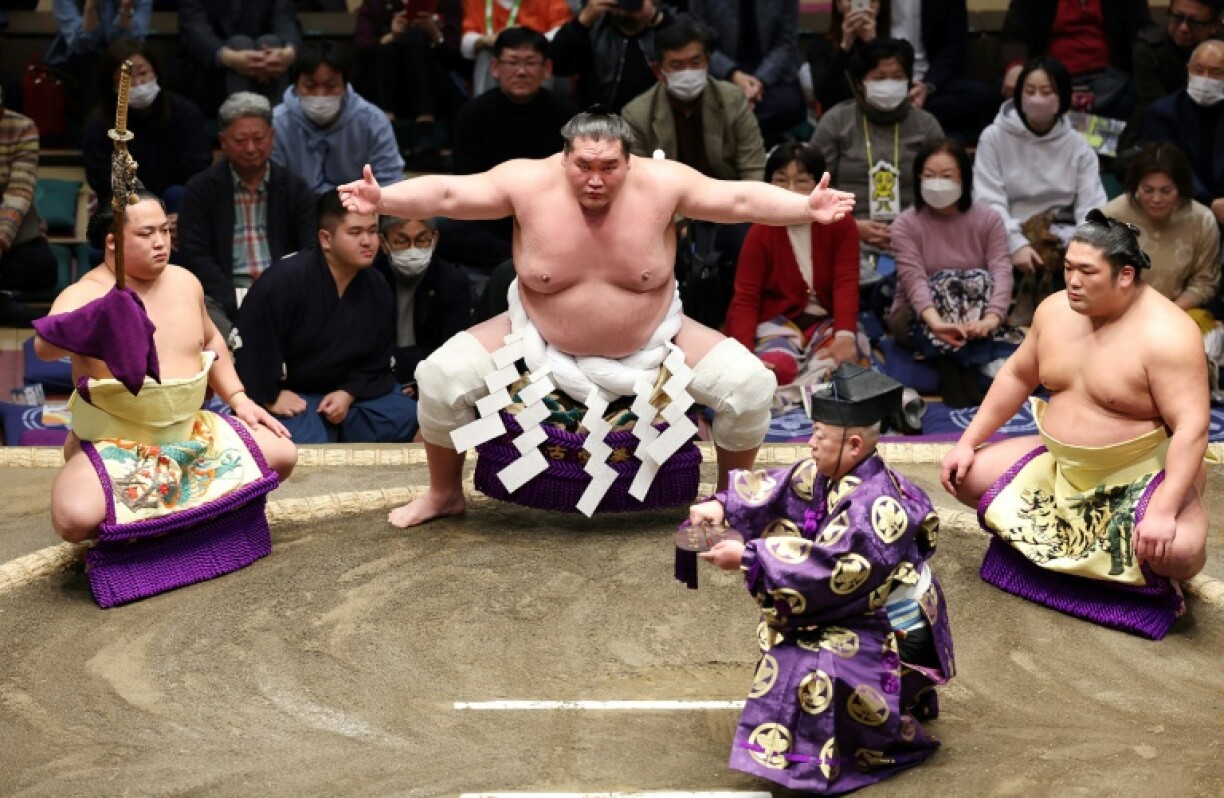 Grand champion Terunofuji (top C) enters the ring at the New Year Grand Sumo Tournament in Tokyo this month, days before announcing his retirement