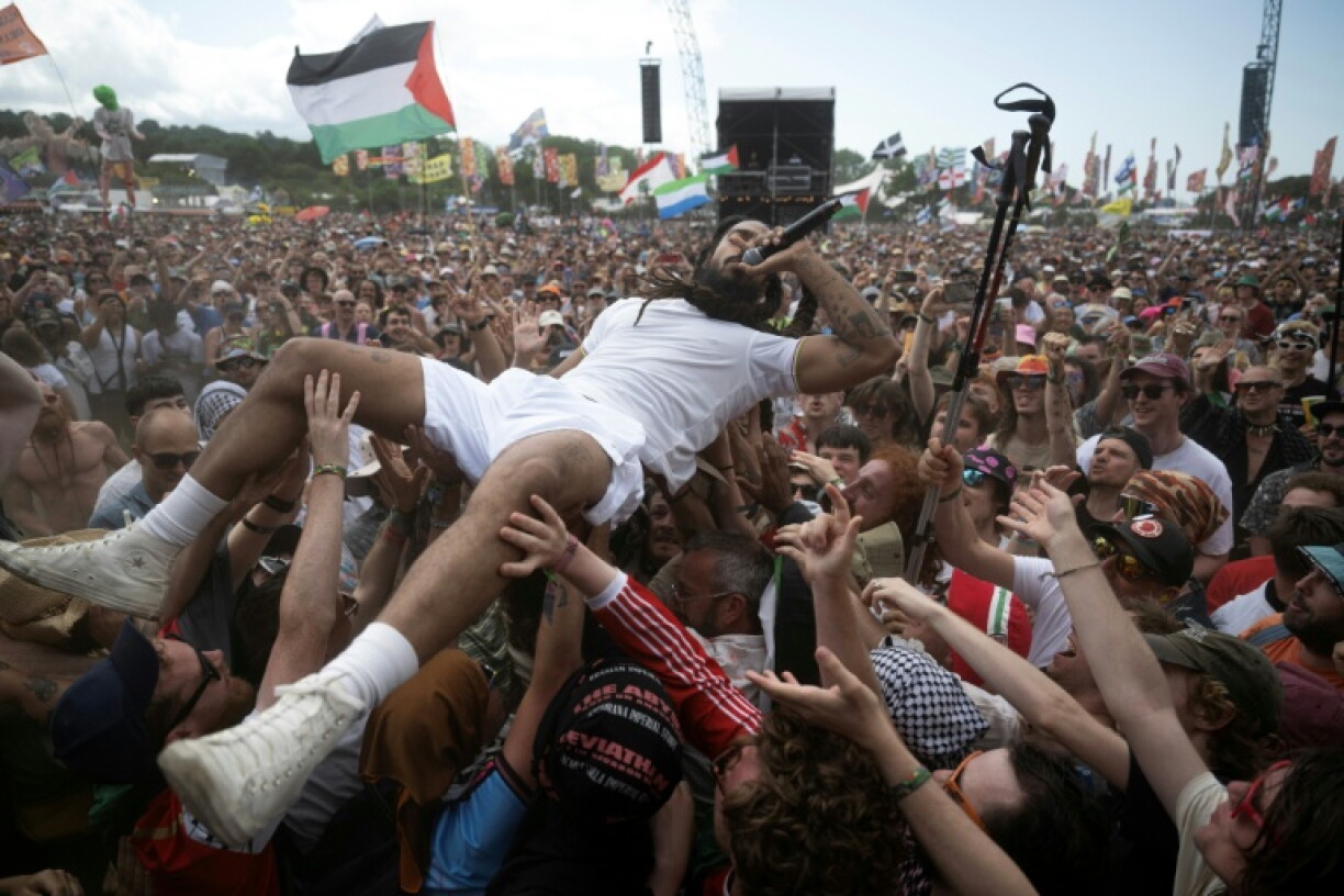 Bobby Vylan crowd surfs while performing at Glastonbury in June 2025, which 210,000 revellers attended