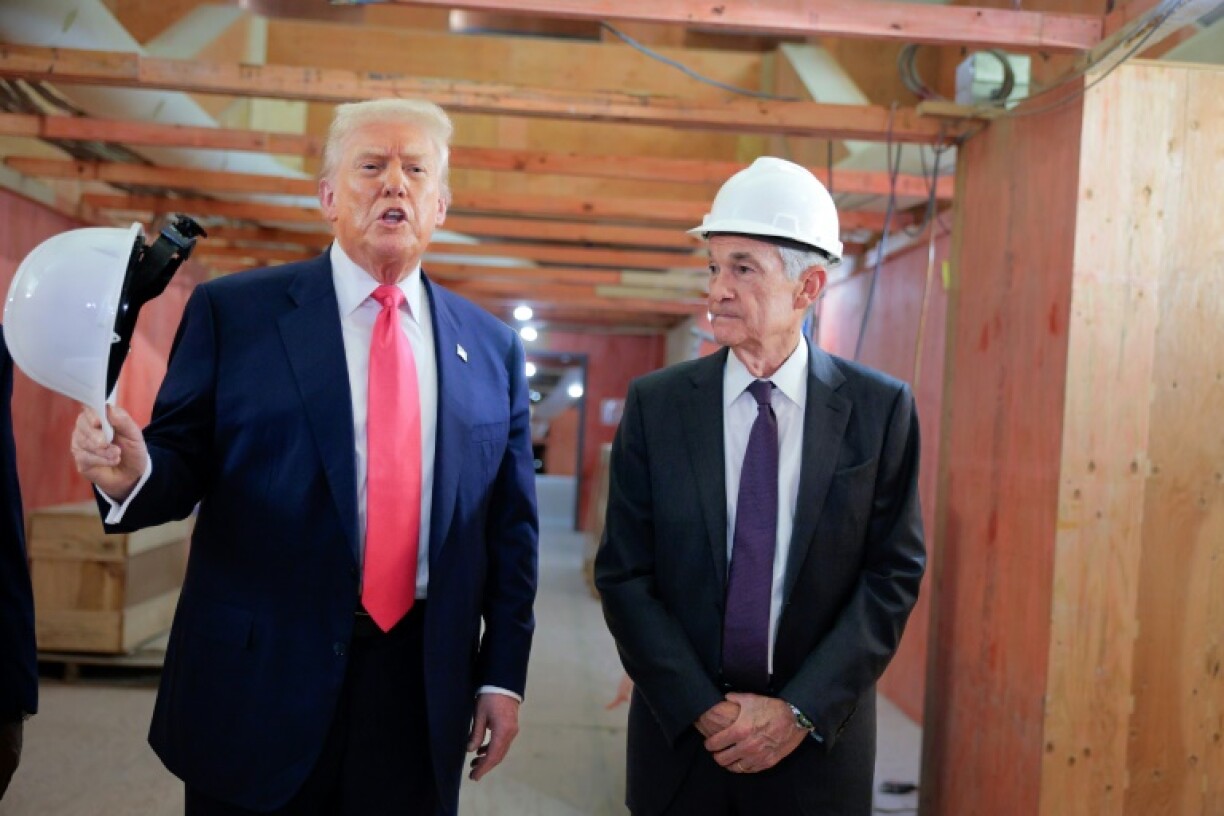 US President Donald Trump delivers remarks alongside Federal Reserve Chair Jerome Powell, as they tour the central bank's $2.5 billion headquarters renovation project on July 24, 2025