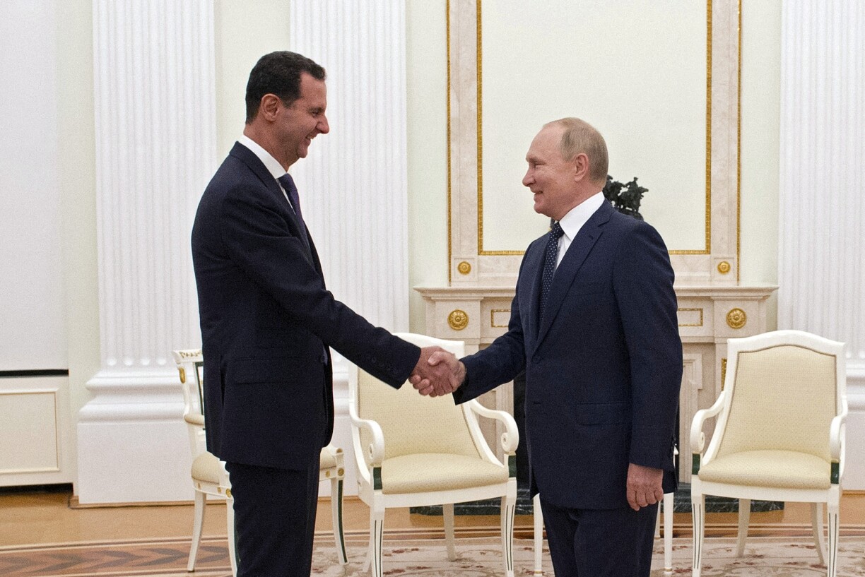 Russian President Vladimir Putin meets with Syrian President Bashar al-Assad at the Kremlin in Moscow on September 13, 2021.