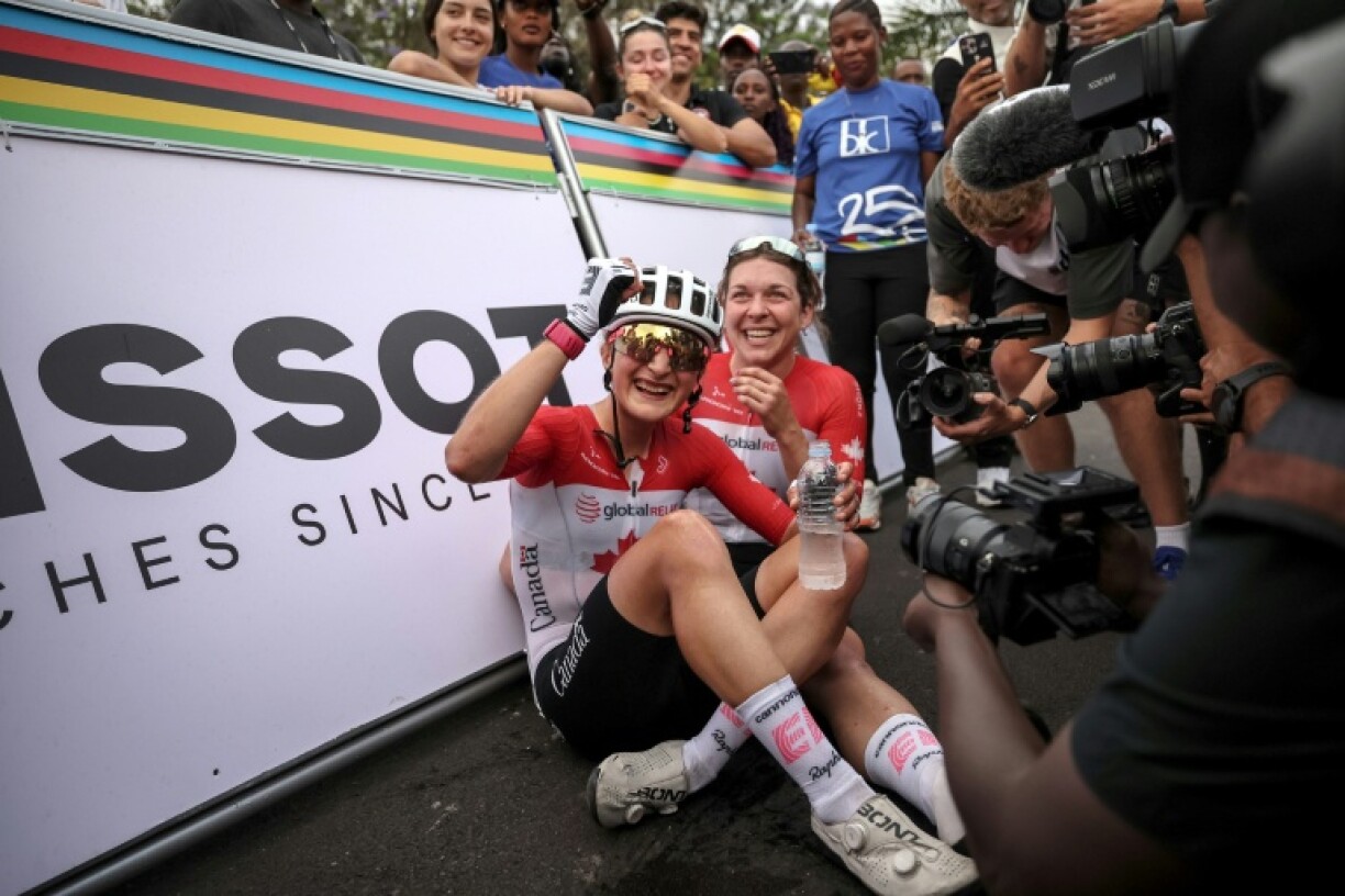 Magdeleine Vallieres (L) celebrating her world title