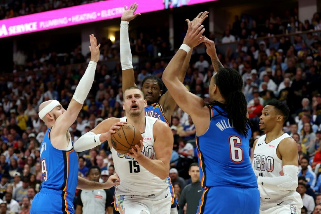 Denver's Nikola Jokic drives to the basket in the Nuggets victory over the Oklahoma City Thunder