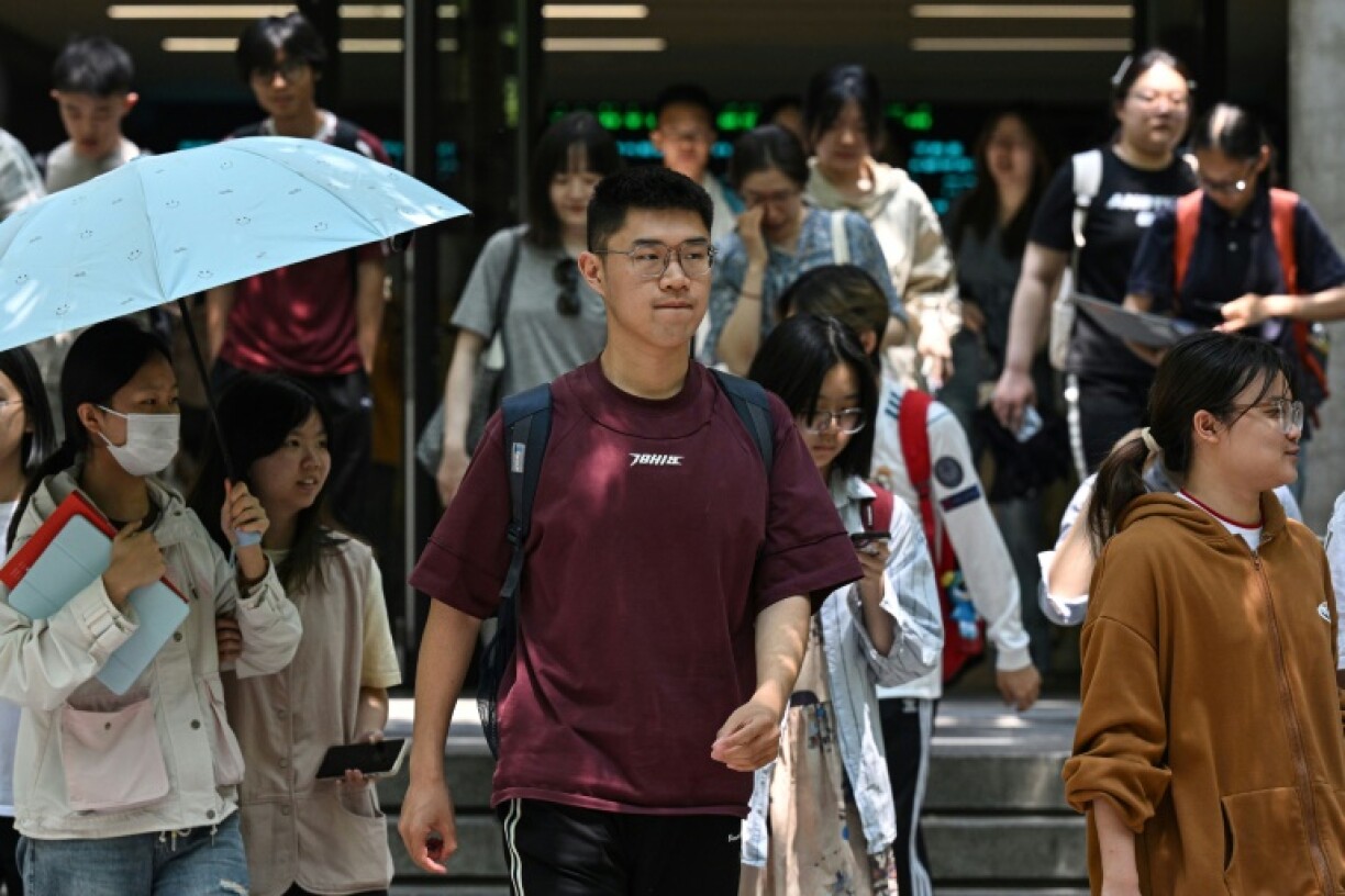 Chinese students walk at Beijing Foreign Studies University in Beijing on May 29, 2025