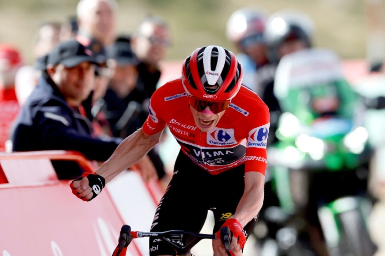 Danish rider Jonas Vingegaard celebrates winning the 20th stage of the Vuelta a Espana and virtually sealing the crown