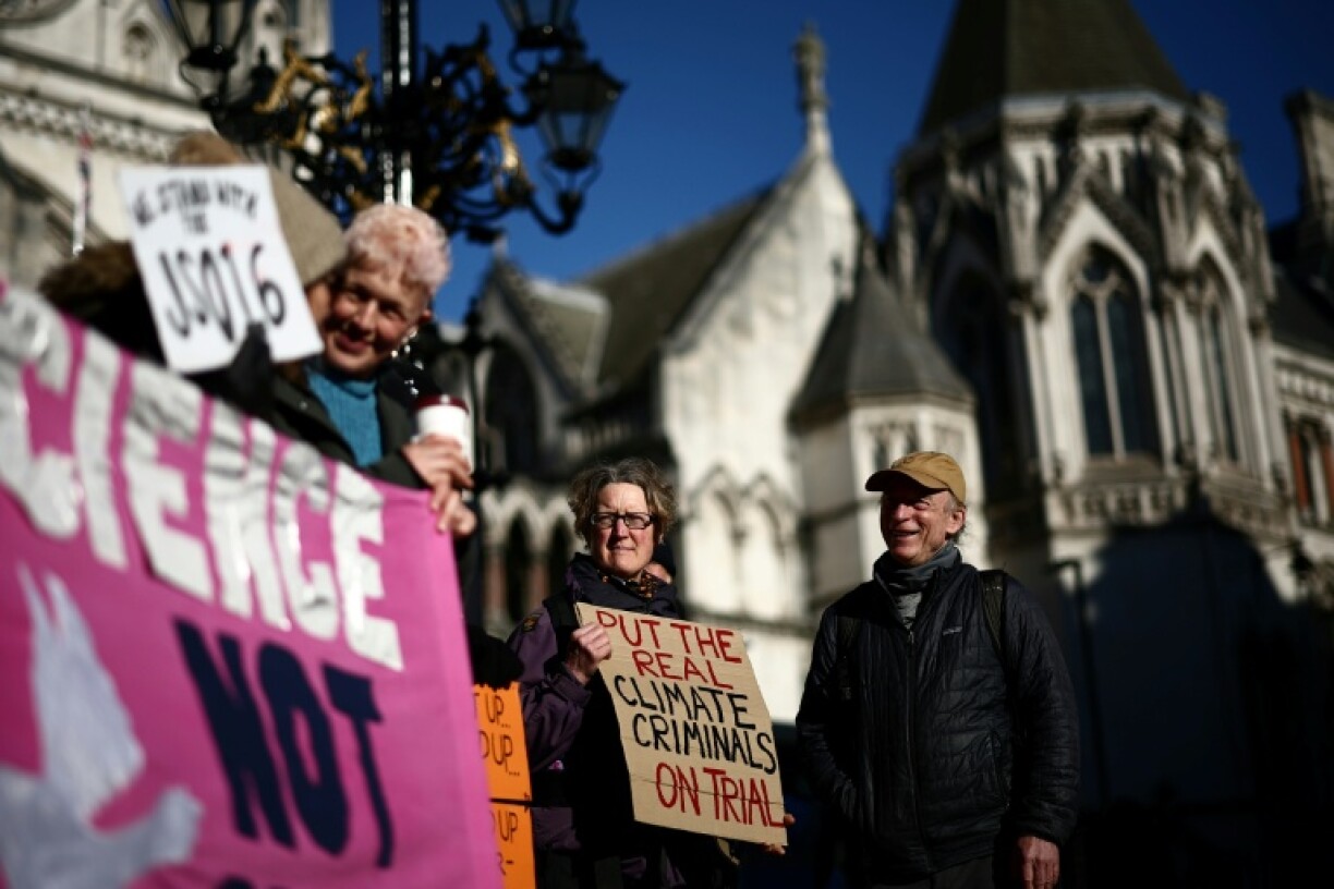 Protesters outside the Royal Courts of Justice in central London to support 16 Just Stop Oil activists