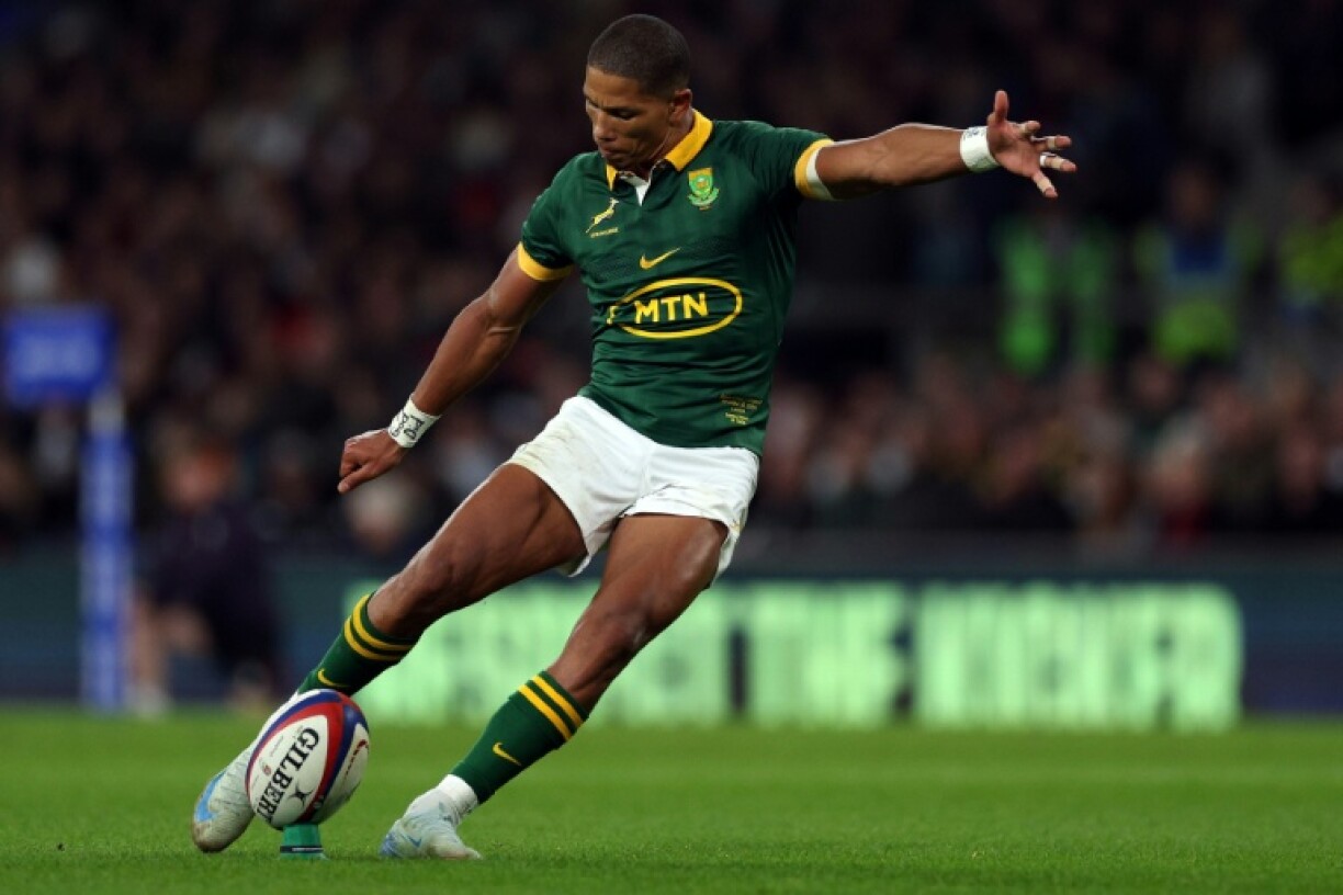 South Africa fly-half Manie Libbok takes a kick at goal.