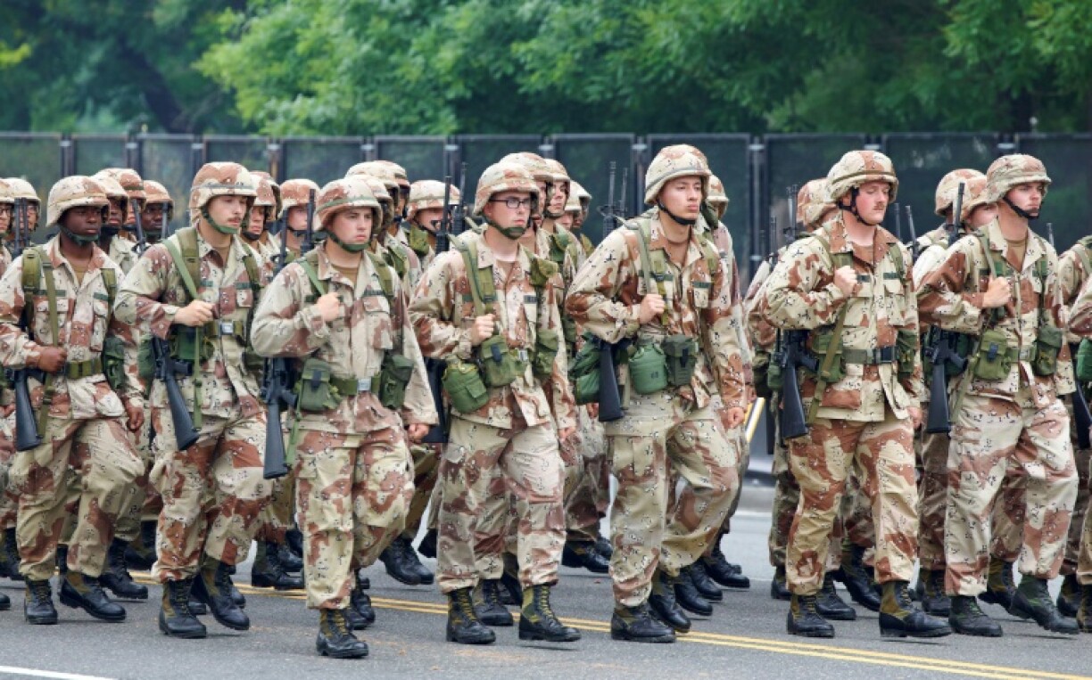 Troops march along Constitution Avenue during the military parade in Washington
