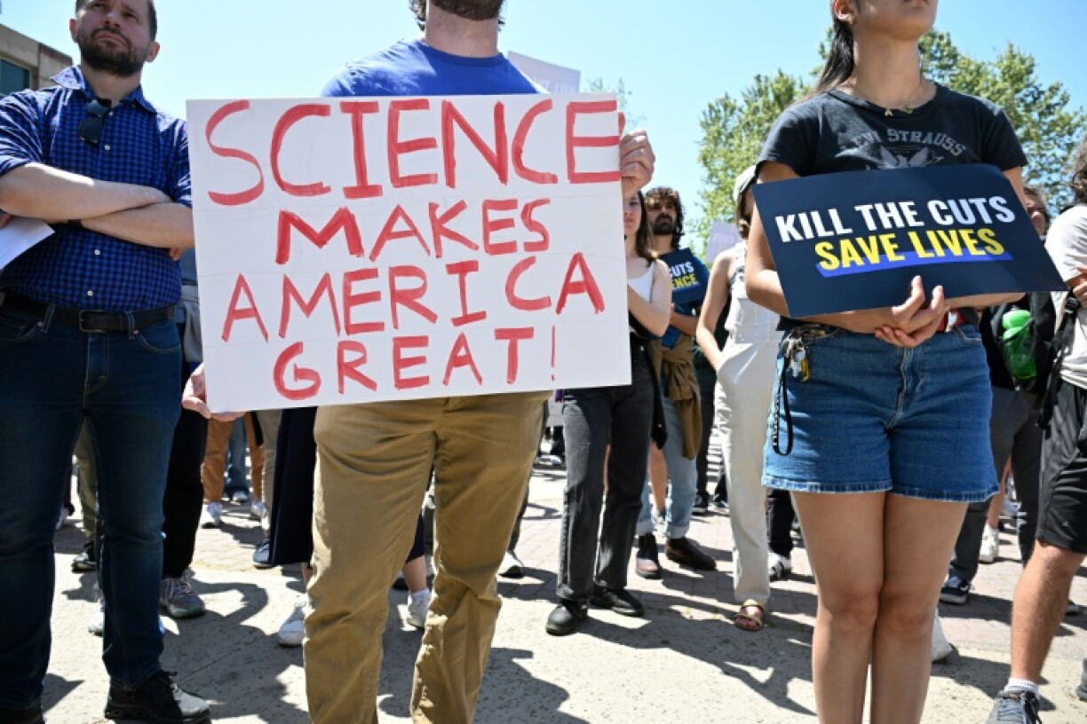 A protest against massive cuts in federal research funding takes place on the campus of UCLA in Los Angeles on April 8, 2025