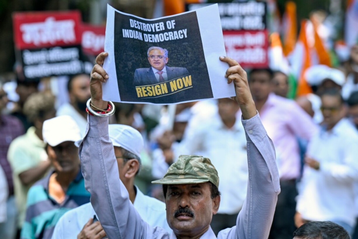 Many protesters expressed anger at India's chief election commissioner over alleged irregularities in a major voter rolls revision process