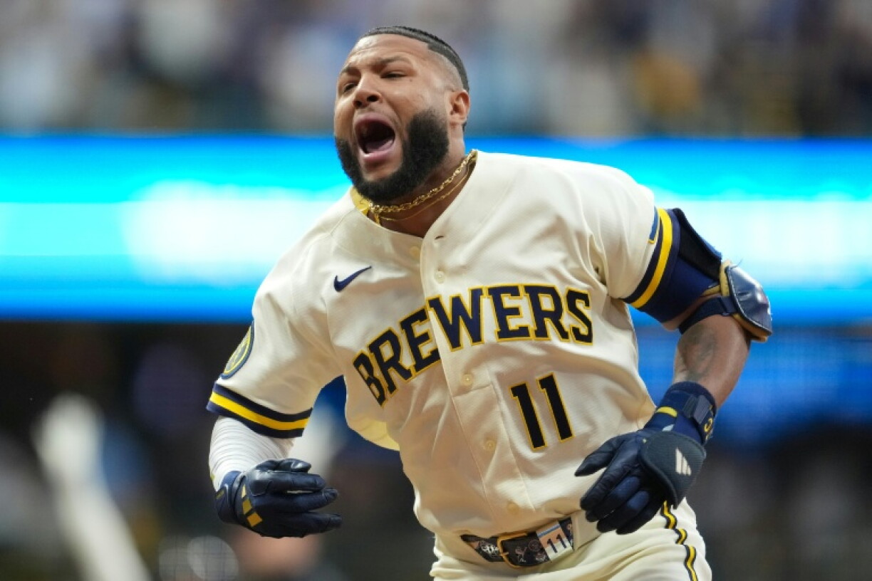 Milwaukee's Jackson Chourio celebrates his game-winning two-run single in the Brewers' win over the San Diego Padres in game two of their MLB playoff series