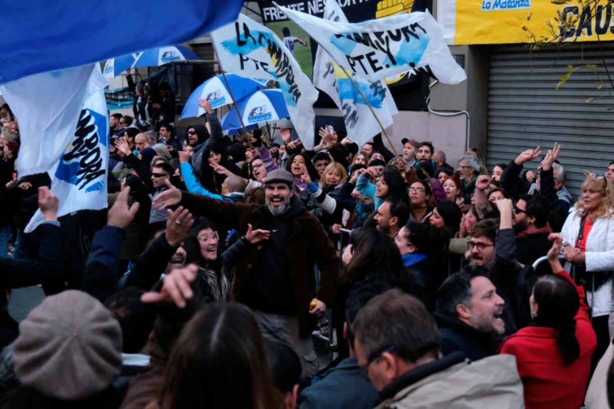 Hundreds of Kirchner's supporters gathered outside her party headquarters to await the Supreme Court ruling