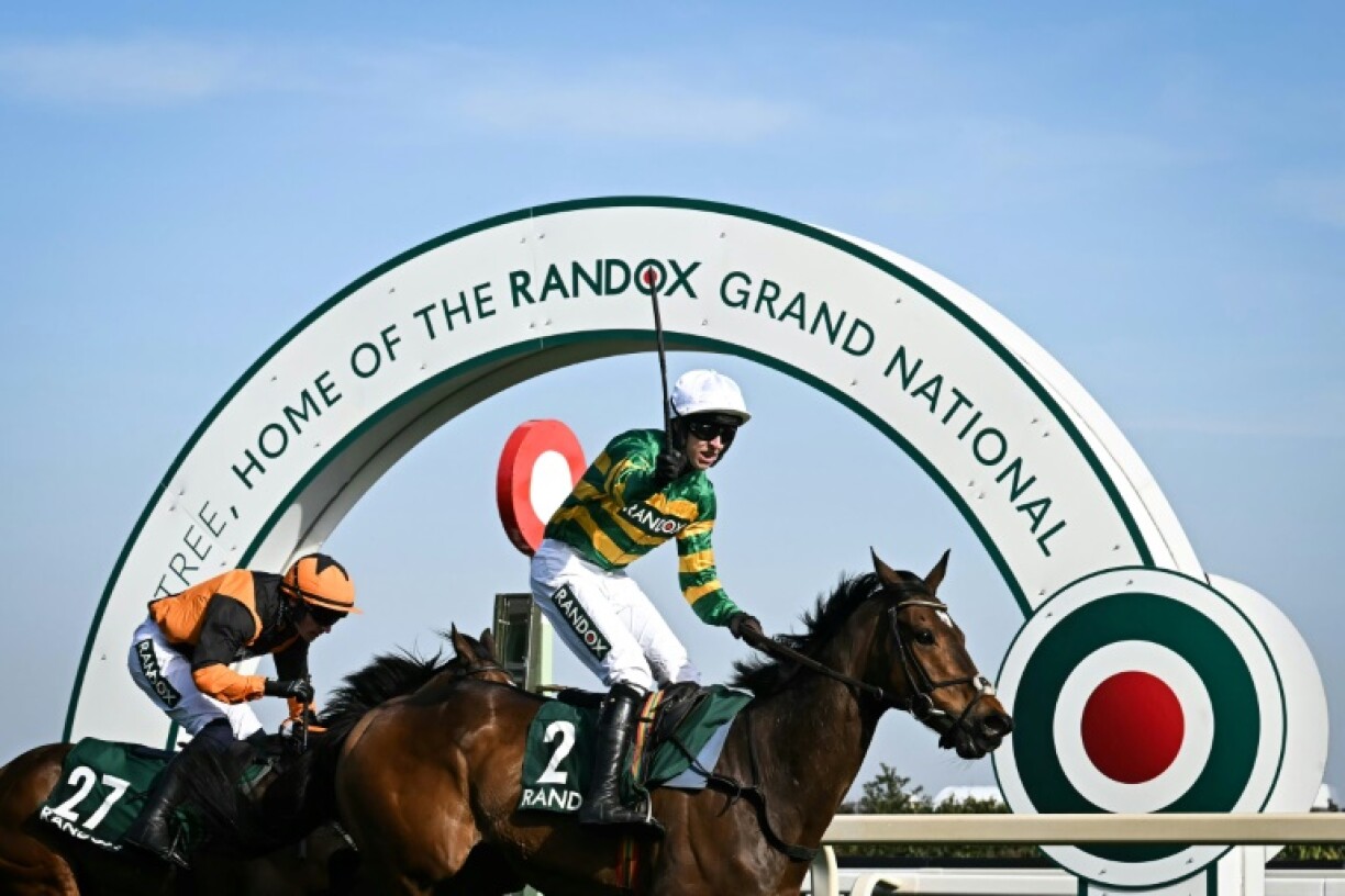 Mark Walsh enjoys that winning feeling after partnering Gentleman De Mee to victory in the Topham Chase over the Grand National fences