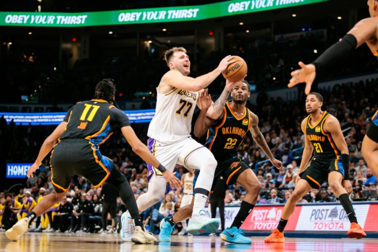 Luka Doncic drives to the basket in the Los Angeles Lakers' blowout win over the Oklahoma City Thunder