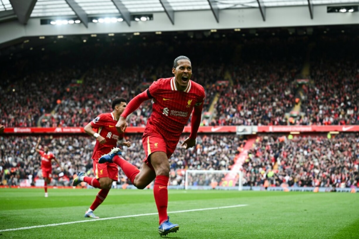 Liverpool defender Virgil van Dijk celebrates scoring against West Ham