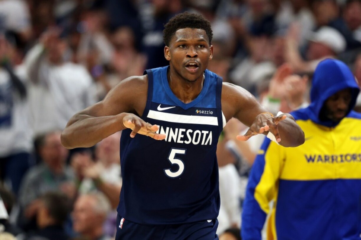 Anthony Edwards celebrates a three-pointer in Minnesota's series-leveling defeat of Golden State