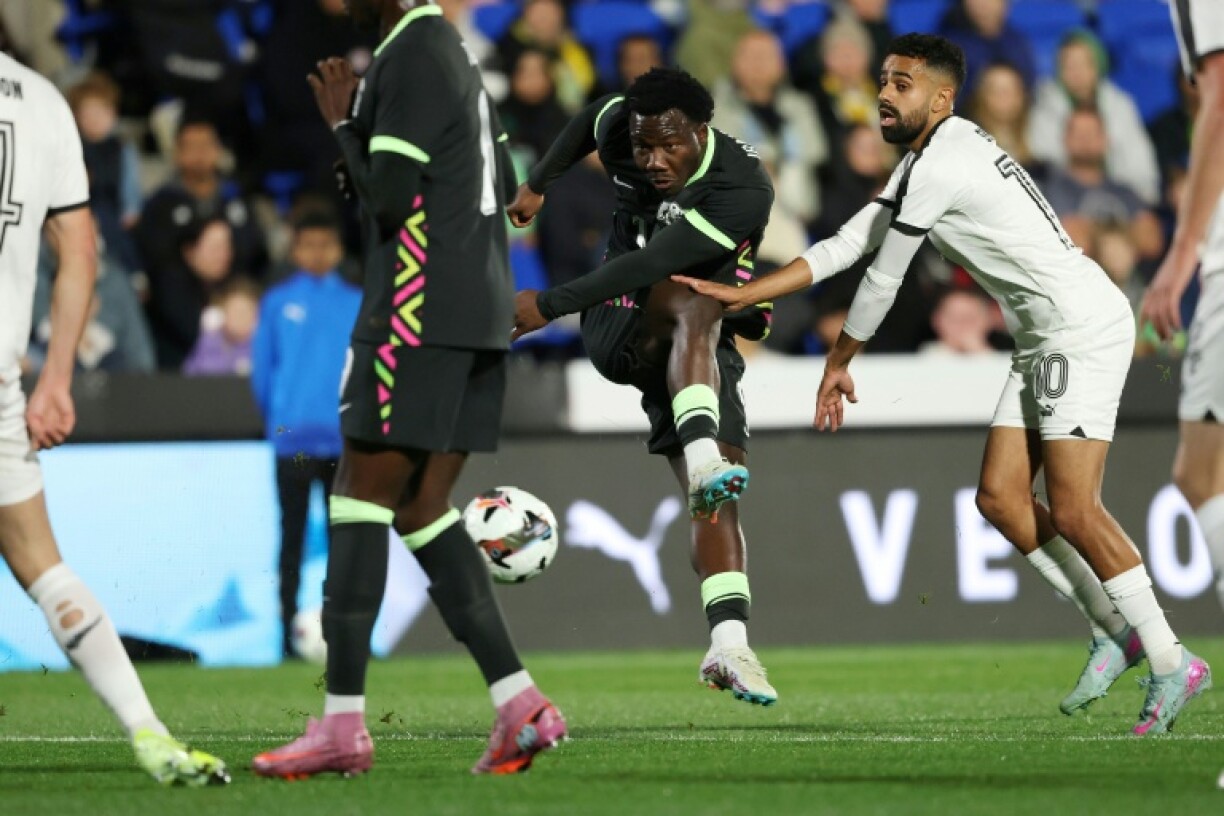 Australia’s Nestory Irankunda takes a shot at goal in Auckland