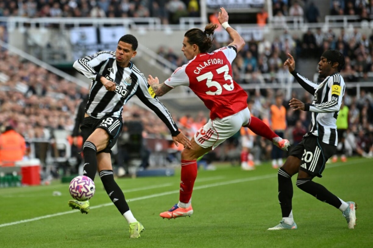 Newcastle striker William Osula (L) in action against Arsenal last month