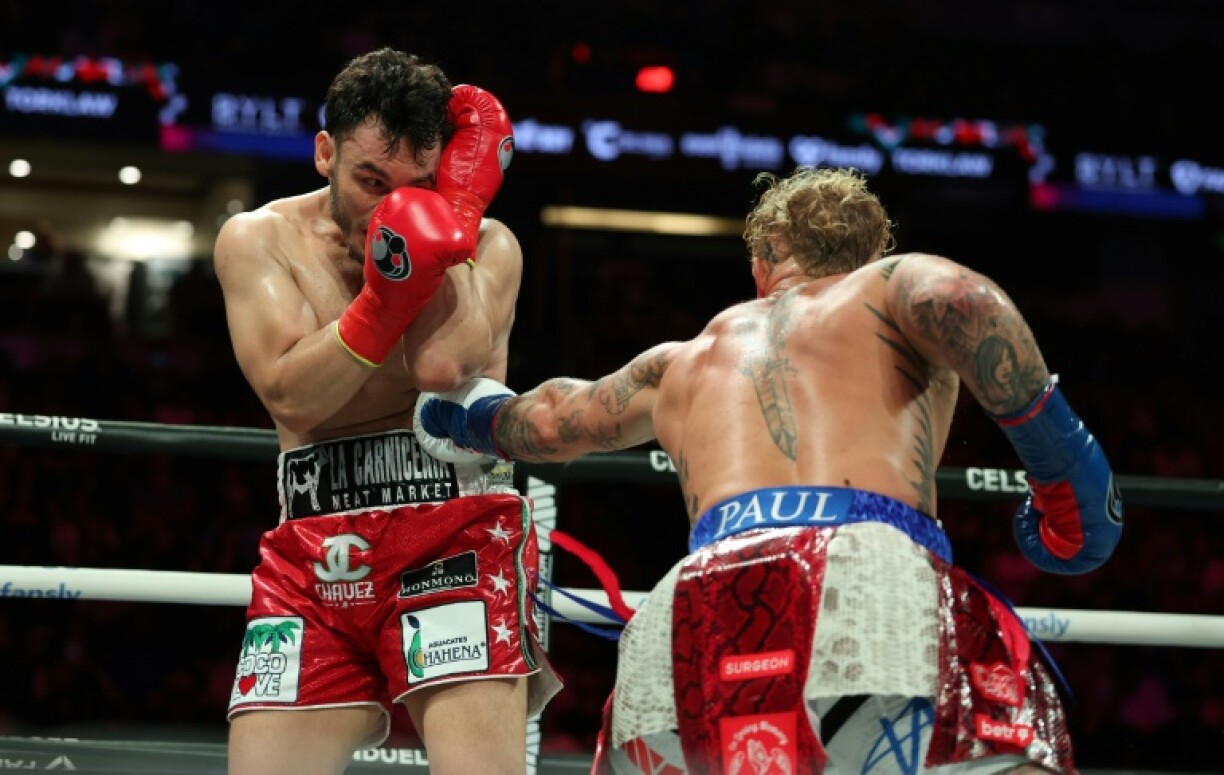 USA's Jake Paul (right) lands a body shot on Mexico's Julio Cesar Chavez Jr during his cruiserweight victory