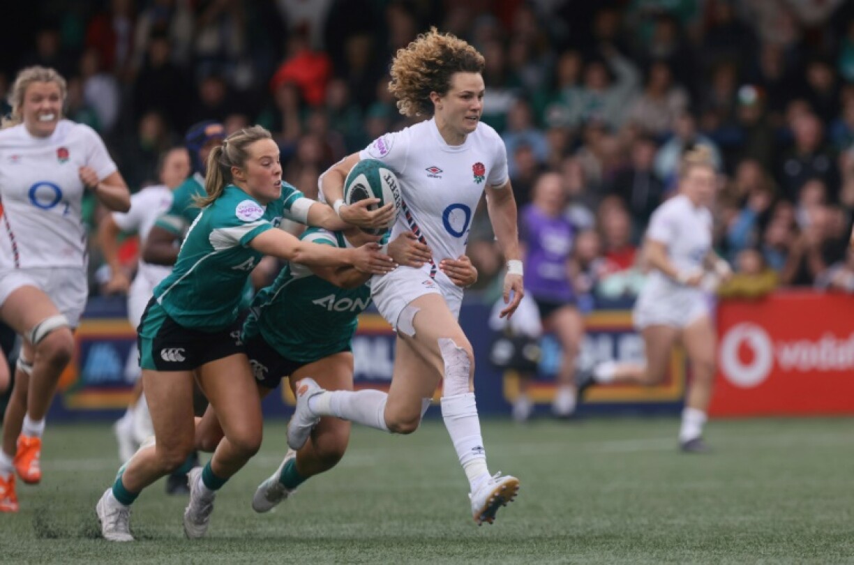 Ellie Kildunne runs in a try during England's 49-5 Women's Six Nations win over Ireland in Cork on April 12