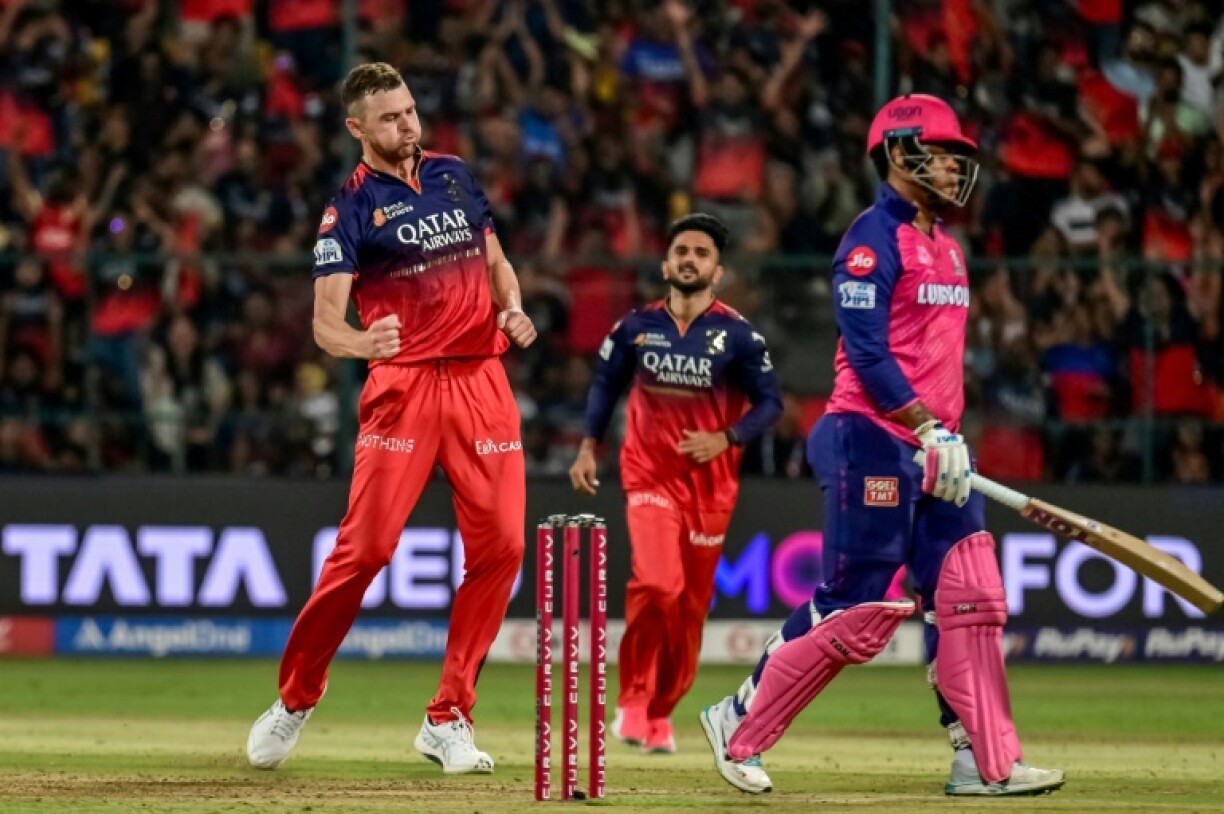 Josh Hazlewood celebrates after taking the wicket of Rajasthan Royals' Shimron Hetmyer