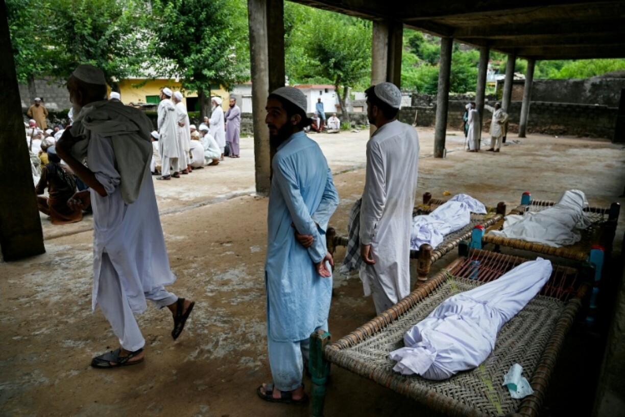 Torrential rains across Pakistan's north have caused flooding and landslides that have swept away entire villages