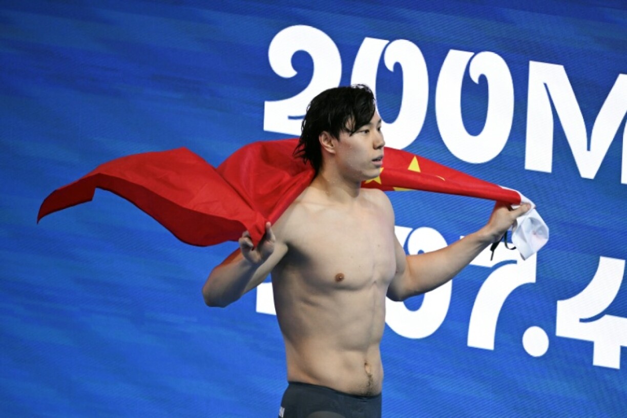 China's Qin Haiyang won the men's 200m breaststroke at the world championships in Singapore on Friday