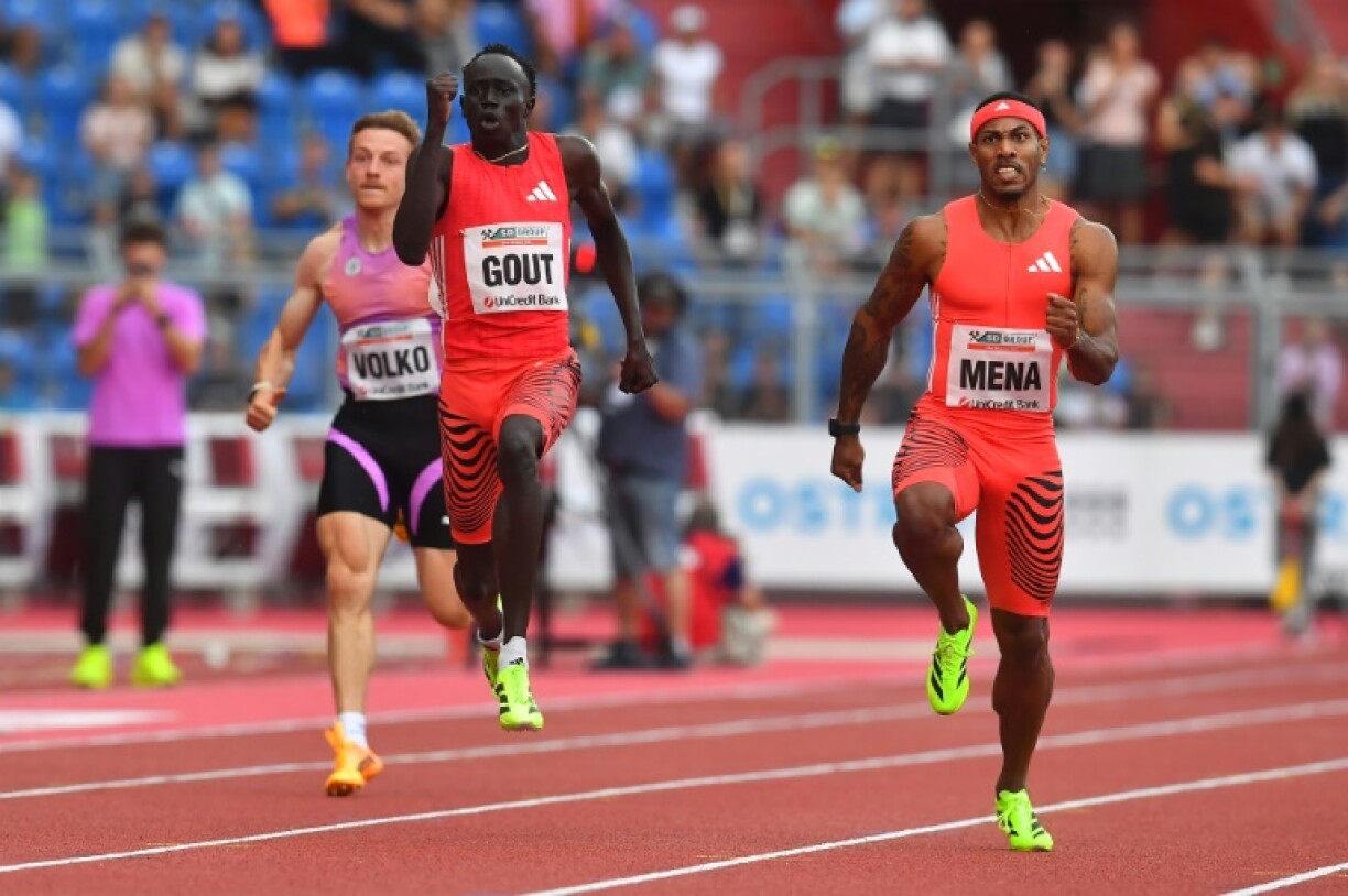 Taking off: Australian Gout Gout (C) surges past Cuban Reynier Mena in the 200m in Ostrava for a first win on the senior international circuit