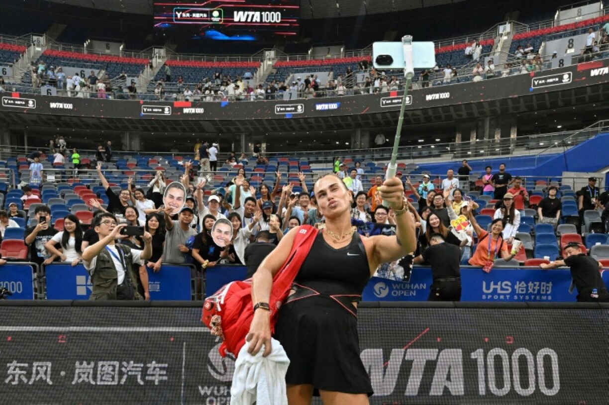 Aryna Sabalenka takes a selfie after beating Liudmila Samsonova in Wuhan