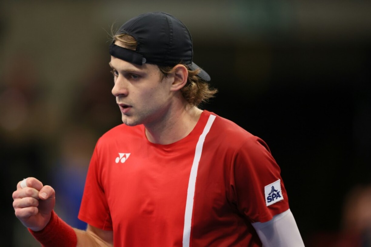 Zizou Bergs celebrates winning a point against Chile's Cristian Garins before the two collided