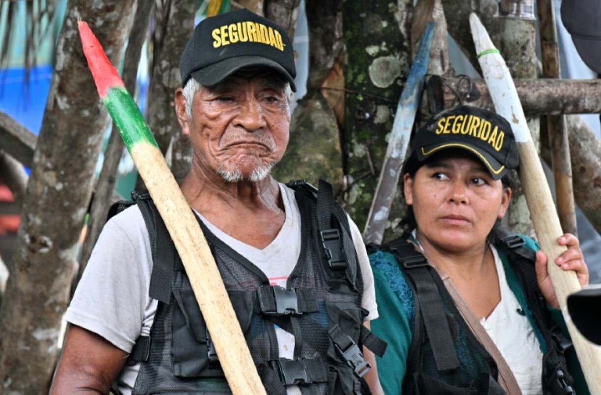 Members of Bolivia's main coca-growers union take turns serving guard duty for two days at a time