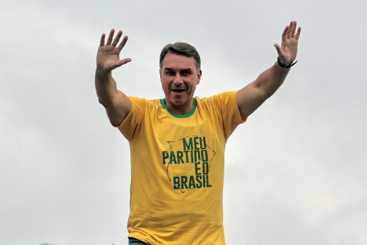 Brazil's right-wing senator and presidential candidate Flavio Bolsonaro of the Liberal Party (PL) waves during a campaign rally on the eve of the general election, in Campo Grande neighborhood, in the western zone of Rio de Janeiro, Brazil on October 3, 2026.