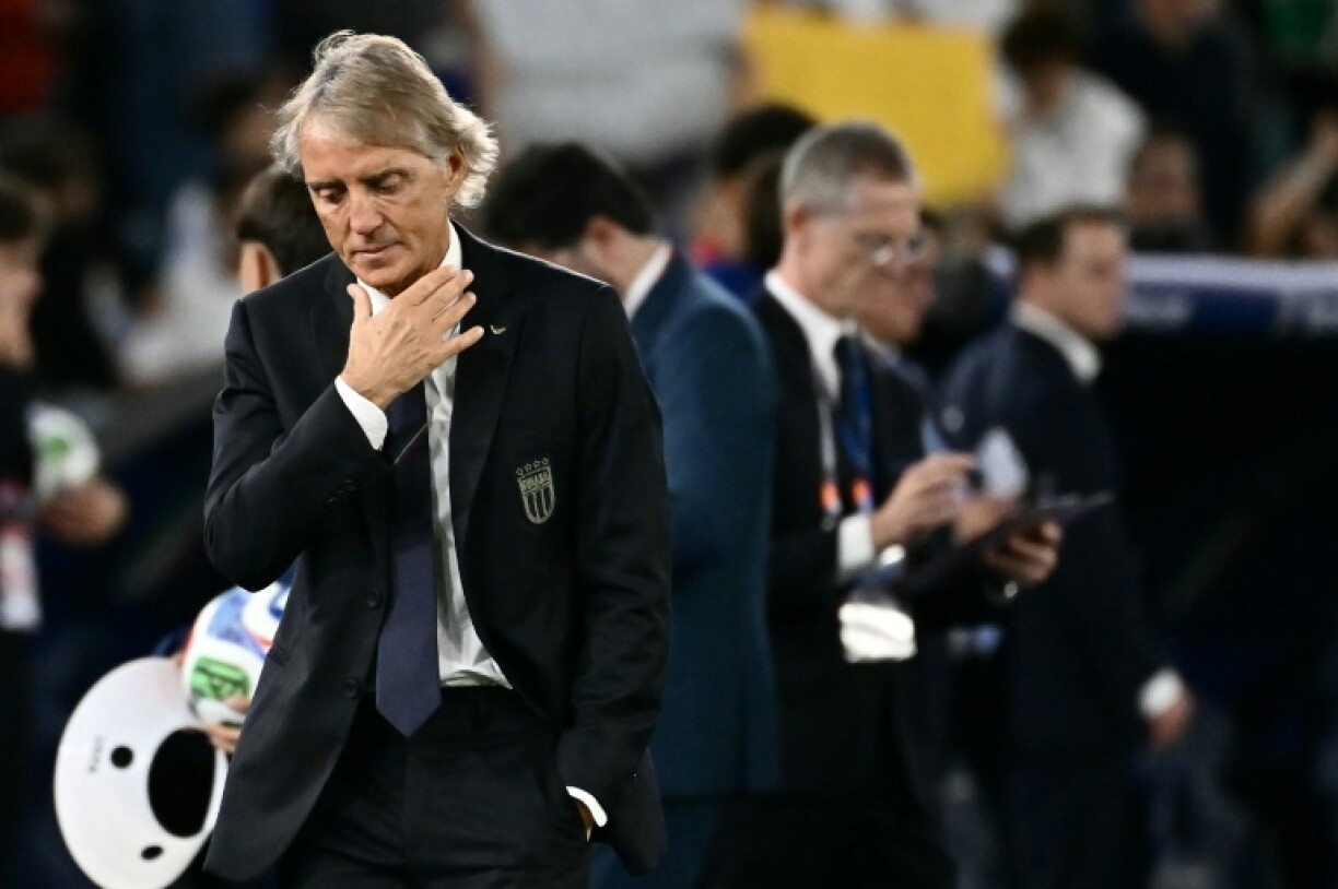Roberto Mancini's Italy slumped to defeat at the hands of Belgium on his return to the national team