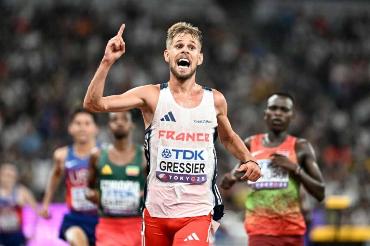 Jimmy Gressier celebrates a surprise win in the men's 10,000m