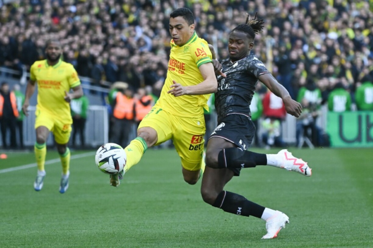 Mostafa Mohamed (L) will sit out Nantes' final match of the Ligue 1 season which takes place on the international day against homophobia