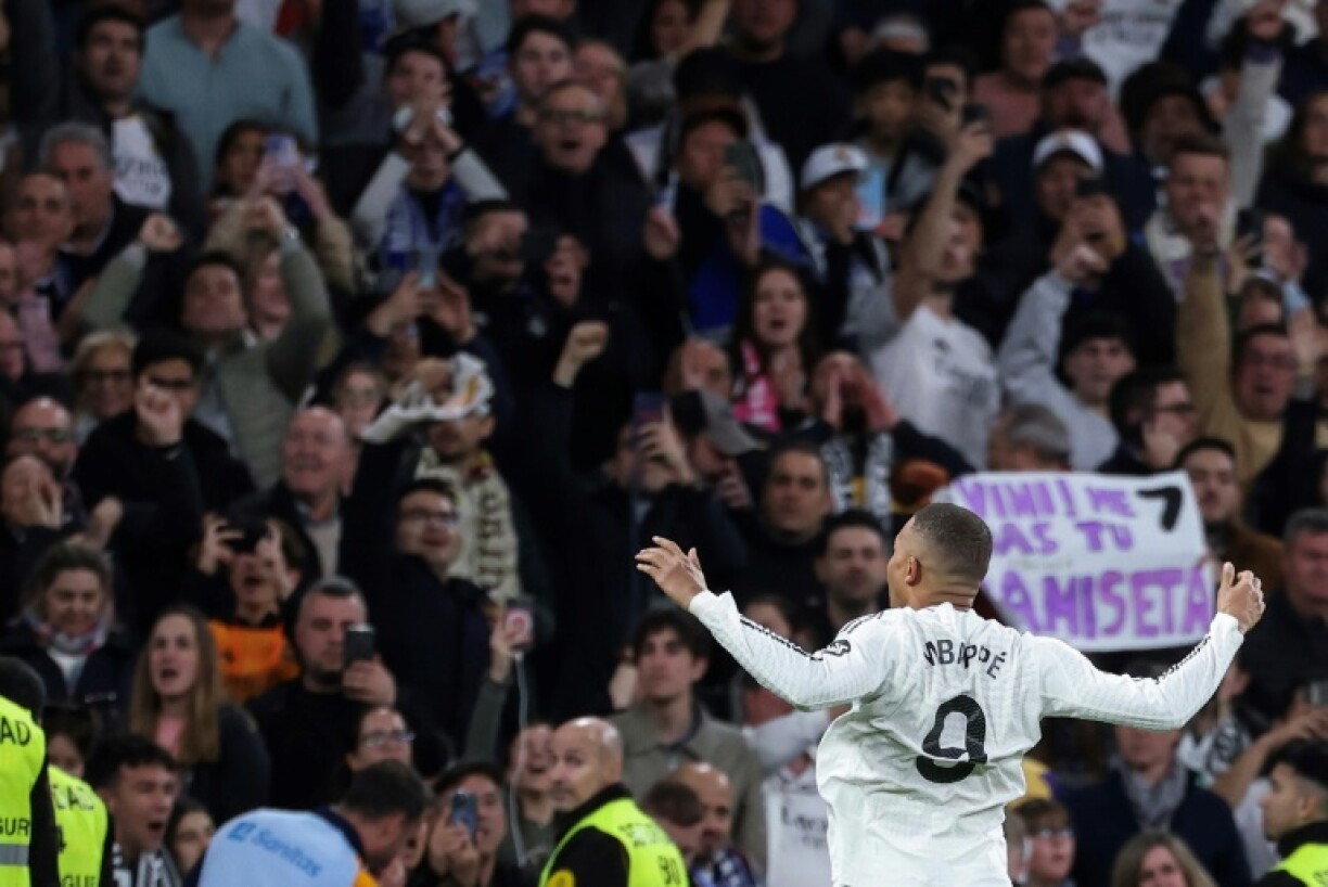 Real Madrid's French forward Kylian Mbappe celebrates scoring their third goal against Leganes