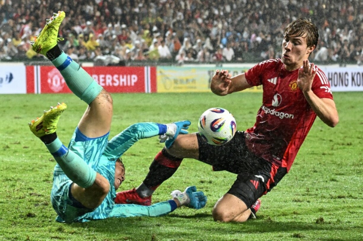 Manchester United's Rasmus Hojlund (right) in action against Hong Kon
