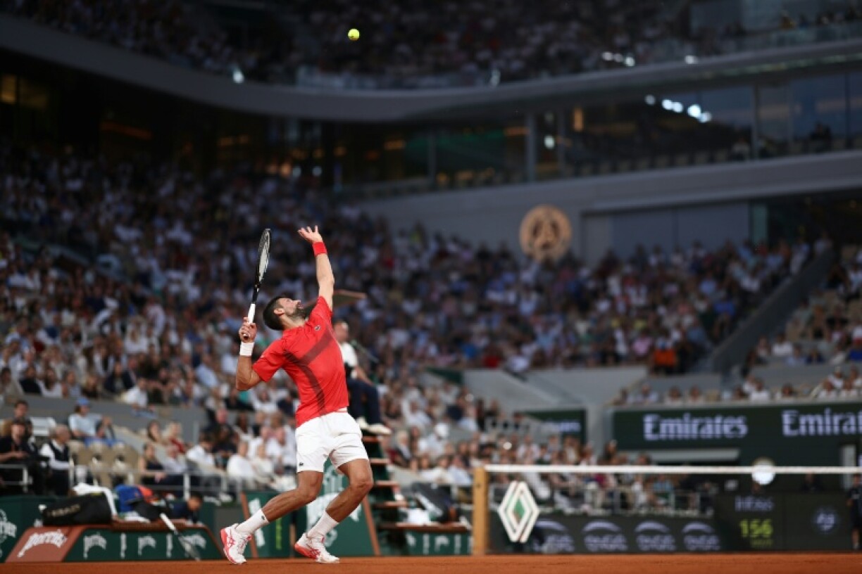 Novak Djokovic serves during his straight-sets victory over Filip Misolic