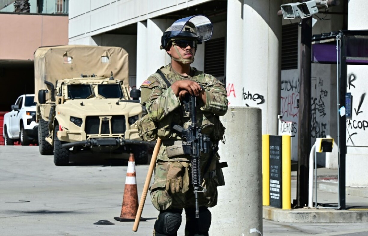 The fatigue-wearing guardsmen have been tasked with protecting federal property in Los Angeles