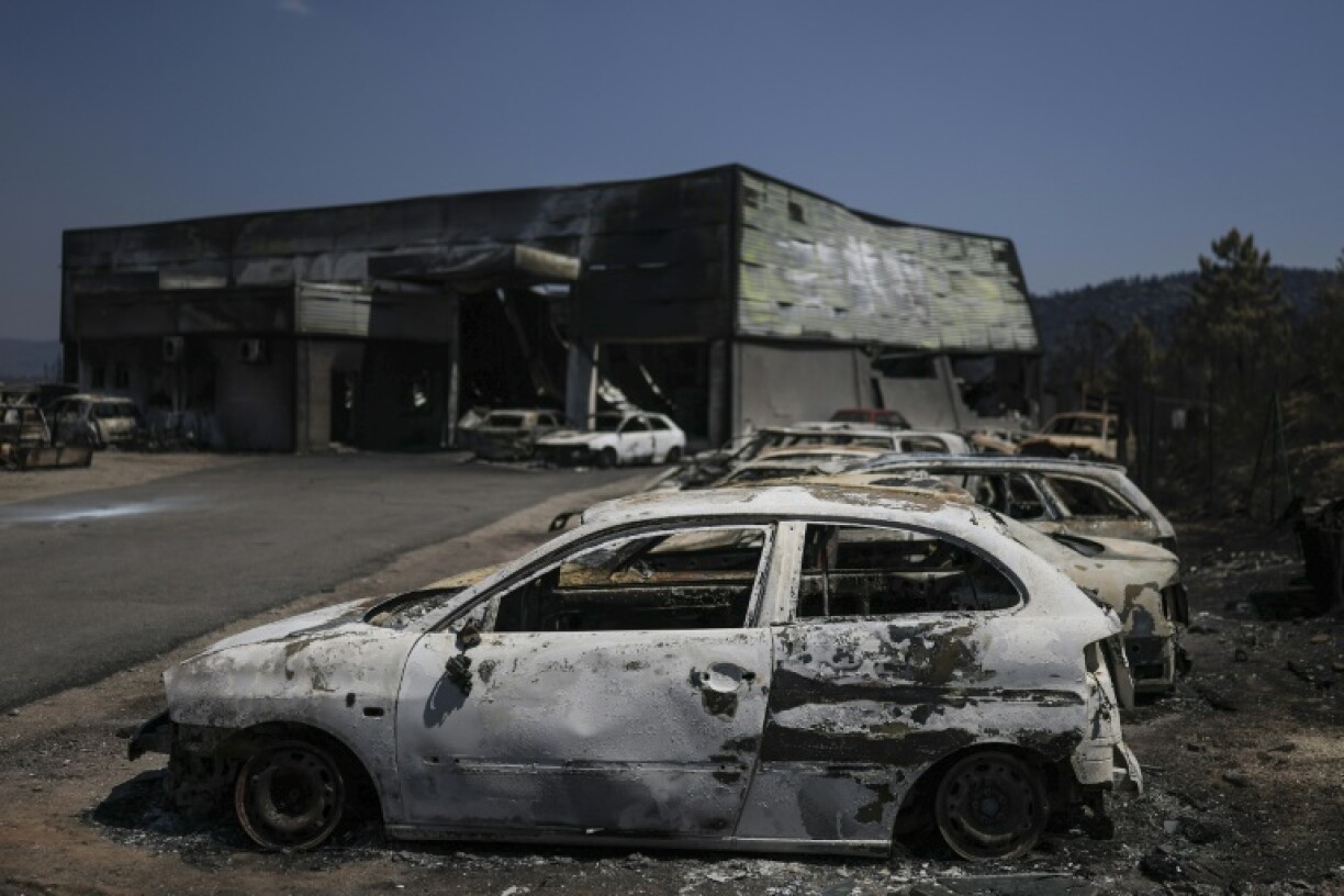 The fires have left charred devastation, as at this car lot in the Portuguese village of Trancoso