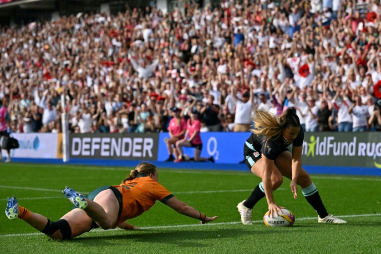 England wing Jess Breach scores against Australia