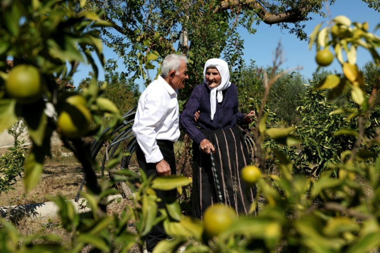 Surrounded by fruit trees, she has spent almost her entire life in the village