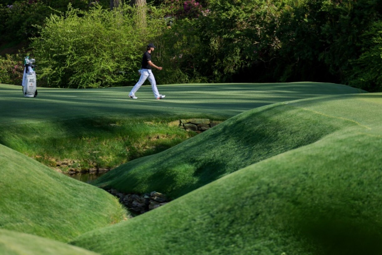 Amateur Jose Luis Ballester of Spain walks past Rae's Creek at the 13th hole during the second round of the Masters, the same area where he took a bathroom break during the first round