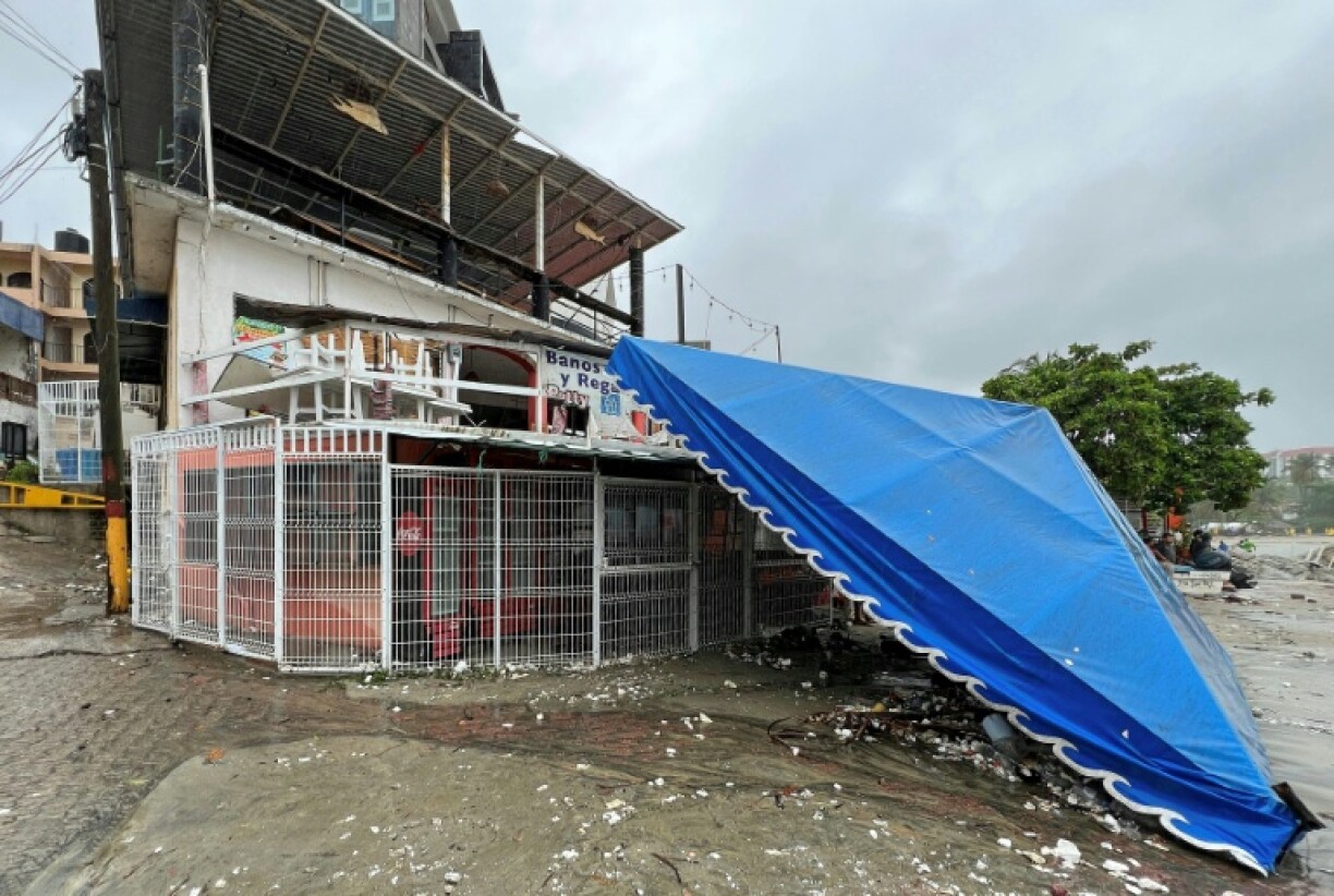 Hurricane Erick slammed into southern Mexico as a Category 3 storm before weakening as it moved inland