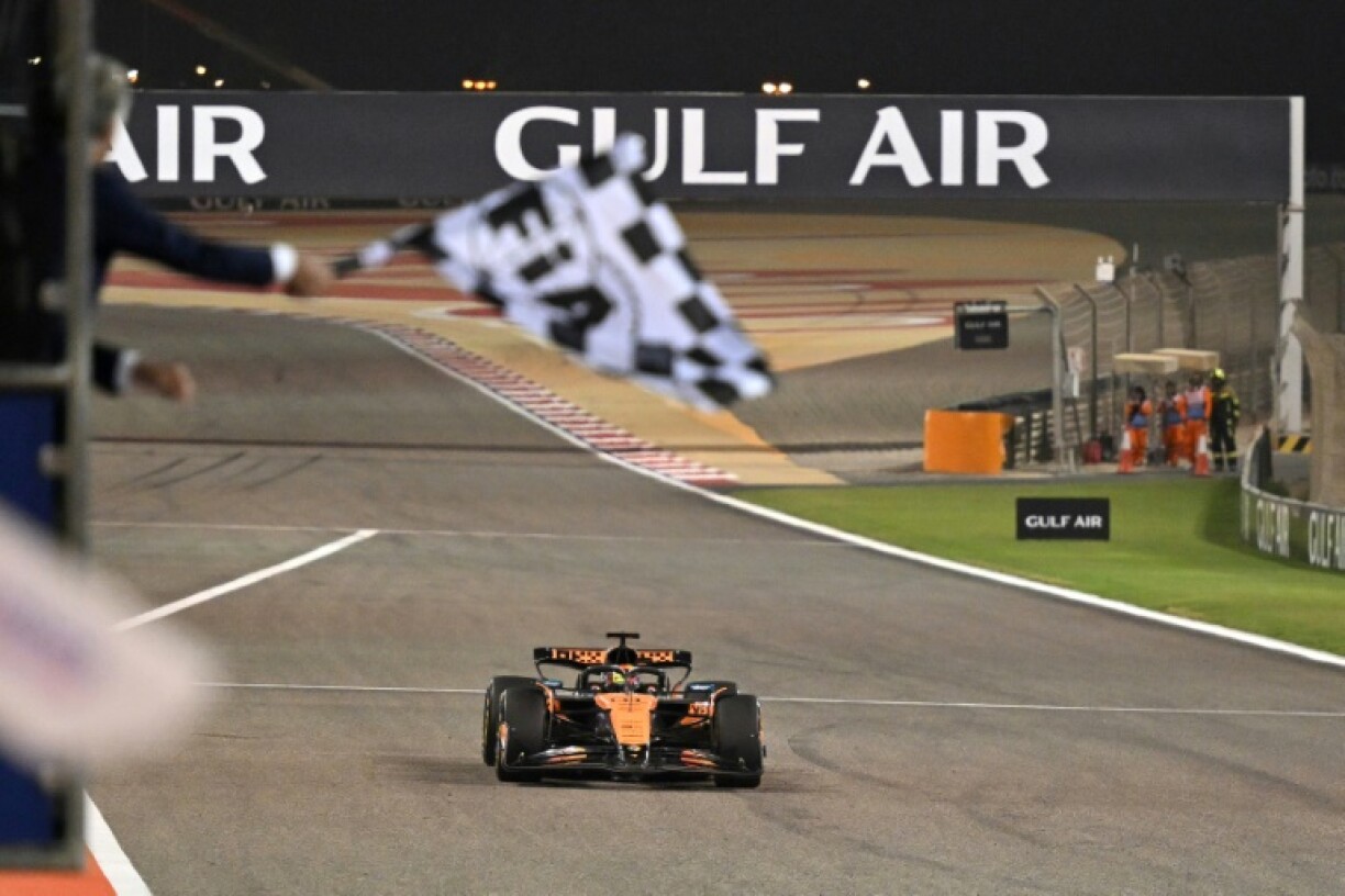 Oscar Piastri takes the chequered flag at the Bahrain Grand Prix