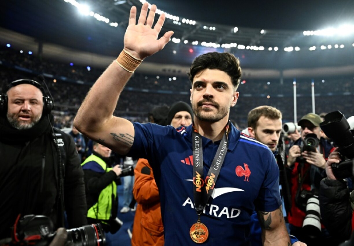 Romain Ntamack (C) made his France debut in 2019