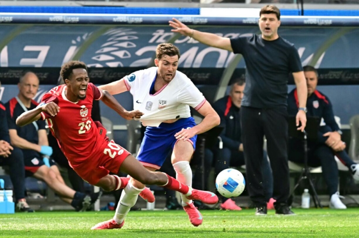 USA coach Mauricio Pochettino (right) looks on during his team's Nations League defeat to Canada