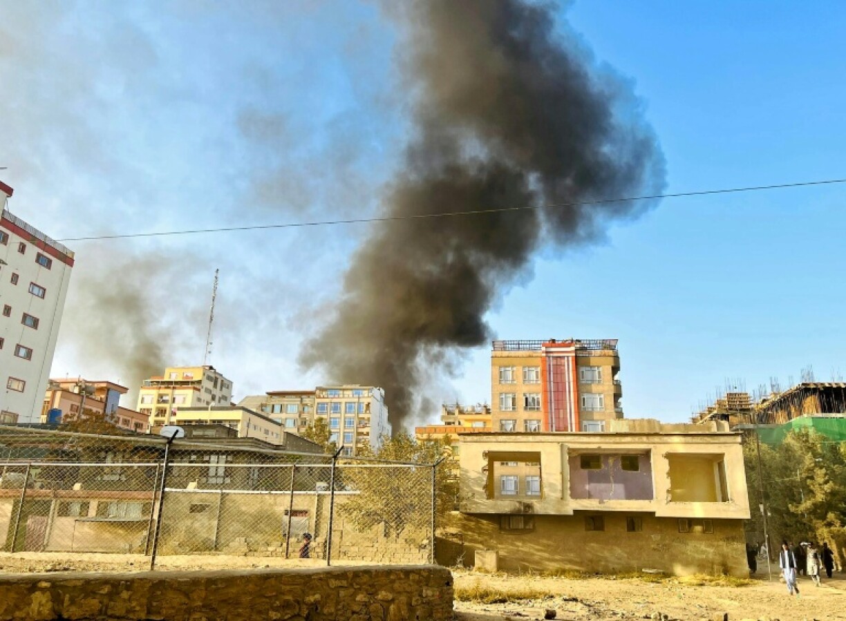 Smoke rises up from the site of explosions in Kabul