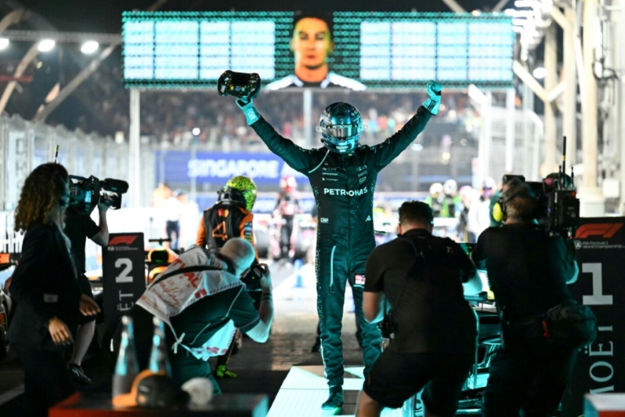 Mercedes driver George Russell celebrates his victory in the Singapore Grand Prix