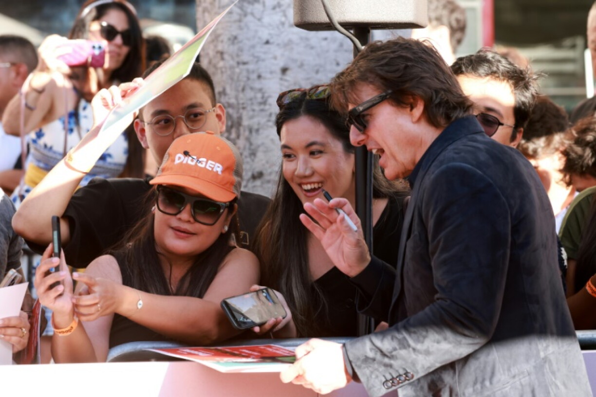 Tom Cruise greets fans at the premiere of 'Digger' in Los Angeles on Monday